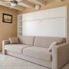 Zidni krevet sa trosjedom Flipflap DW 140x200 u prostoru zatvoreni